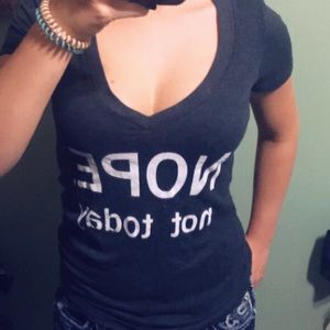 Low v neck T-shirt, says “NOPE. not today”